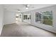 Bright living room features neutral tones, plenty of natural light, and a view of the exterior at 215 Rydalmont Rd, Winter Haven, FL 33884