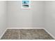 Small bonus room featuring tile floor and a window at 215 Rydalmont Rd, Winter Haven, FL 33884