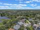 Aerial view showing the location of the property among the surrounding trees at 219 Isle Of Sky Cir, Orlando, FL 32828