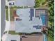 An aerial view of the home's roof and screened in pool at 219 Isle Of Sky Cir, Orlando, FL 32828