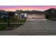 Charming home with manicured lawn and a three-car garage at 219 Isle Of Sky Cir, Orlando, FL 32828