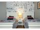 Charming bedroom featuring twin beds, a comic-themed wall, and a matching nightstand at 2515 Dharma Cir, Kissimmee, FL 34746