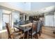 Dining area with modern decor, high ceilings, gray walls and seating for eight at 2515 Dharma Cir, Kissimmee, FL 34746