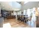 Dining and Kitchen area with high ceilings, modern decor, natural light, and seating for eight at 2515 Dharma Cir, Kissimmee, FL 34746