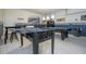 Garage rec room features a foosball table and pool table at 2515 Dharma Cir, Kissimmee, FL 34746