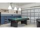 Garage rec room features a pool table and airplane art at 2515 Dharma Cir, Kissimmee, FL 34746
