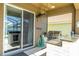 Covered patio showing the outdoor kitchen and access to the swimming pool at 2515 Dharma Cir, Kissimmee, FL 34746
