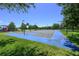 Community basketball court with playground and sand volleyball in background at 2605 Gala S Rd # 106, Kissimmee, FL 34746