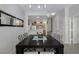 Dining area with seating for six, open to the kitchen and staircase at 2605 Gala S Rd # 106, Kissimmee, FL 34746