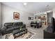Inviting living room and dining area with an open floor plan leading to the kitchen at 2605 Gala S Rd # 106, Kissimmee, FL 34746