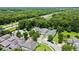 Overhead view of upscale homes surrounded by lush greenery, showcasing a well-planned community layout and serene setting at 2621 Peony Dr, Oviedo, FL 32766