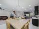 Open-concept dining area, kitchen, and living room provide ample space for entertaining at 2621 Peony Dr, Oviedo, FL 32766