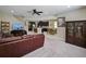 Spacious living room showing an open floor plan into the kitchen area at 2621 Peony Dr, Oviedo, FL 32766