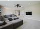 Spacious loft featuring a large seating area and built-in storage at 2621 Peony Dr, Oviedo, FL 32766