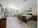 Spacious main bedroom with neutral colors, carpet flooring, and ample natural light at 2621 Peony Dr, Oviedo, FL 32766