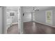 Large bedroom features tile floors and an attached bathroom with shower at 2630 S Tanner Rd, Orlando, FL 32820