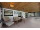 Spacious covered patio with wood ceiling is perfect for entertaining at 2630 S Tanner Rd, Orlando, FL 32820