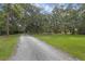 A driveway leading to a property at 2630 S Tanner Rd, Orlando, FL 32820