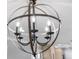 Contemporary sphere chandelier with decorative candelabra style lighting at 2630 S Tanner Rd, Orlando, FL 32820