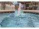 Inviting pool area featuring a sparkling fountain and cozy outdoor seating at 2630 S Tanner Rd, Orlando, FL 32820