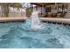 Inviting pool area featuring a sparkling fountain and cozy outdoor seating at 2630 S Tanner Rd, Orlando, FL 32820