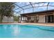 Large pool and hot tub create a resort-like backyard oasis at 2630 S Tanner Rd, Orlando, FL 32820