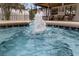 Inviting pool area featuring a sparkling fountain and cozy outdoor seating at 2630 S Tanner Rd, Orlando, FL 32820
