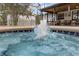 Inviting pool area featuring a sparkling fountain and cozy outdoor seating at 2630 S Tanner Rd, Orlando, FL 32820