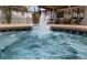 Inviting pool area featuring a sparkling fountain and cozy outdoor seating at 2630 S Tanner Rd, Orlando, FL 32820