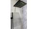 Stylish shower features a sleek shower head, gray tile, and decorative marble accent at 2630 S Tanner Rd, Orlando, FL 32820