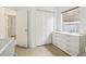 Bright bedroom featuring tiled floors, closet space, large dresser, and a window at 298 San Gabriel St, Winter Springs, FL 32708