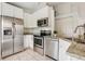 Modern kitchen featuring stainless steel appliances, granite countertops, and ample cabinet space at 298 San Gabriel St, Winter Springs, FL 32708