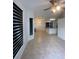 Open layout with tile floors offers easy flow into kitchen at 298 San Gabriel St, Winter Springs, FL 32708