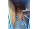 Interior of the shed with wood walls and shelving for storage at 298 San Gabriel St, Winter Springs, FL 32708