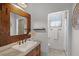 Cozy bathroom with custom vanity, vessel sink, and neutral finishes at 3601 S Summerlin Ave, Orlando, FL 32806