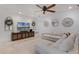 The living room features tile floors, a comfortable sectional, and stylish design accents at 3601 S Summerlin Ave, Orlando, FL 32806