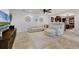 Spacious living room offering an open floor plan with tile floors and a large sectional couch at 3601 S Summerlin Ave, Orlando, FL 32806