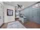 Stylish office with custom built-ins, hardwood floors, and baseball memorabilia at 3601 S Summerlin Ave, Orlando, FL 32806