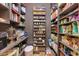 Well-organized walk-in pantry with ample shelving for food storage at 3601 S Summerlin Ave, Orlando, FL 32806