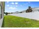 Expansive backyard with a pristine white fence, perfect for outdoor enjoyment at 410 Winter Bliss Ln, Mount Dora, FL 32757