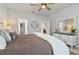 Charming main bedroom showcasing elegant decor, soft textures, and serene natural light at 410 Winter Bliss Ln, Mount Dora, FL 32757
