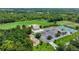 Overhead view of neighborhood park with baseball field, tennis courts, playground, and ample parking at 410 Winter Bliss Ln, Mount Dora, FL 32757