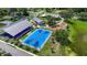 Community park view featuring picnic pavilions, playground, and basketball courts for recreation at 410 Winter Bliss Ln, Mount Dora, FL 32757