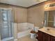 Bathroom featuring a tub, shower and vanity at 438 Janice Kay Pl, Kissimmee, FL 34744