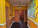 Hallway with decorative painting and hardwood floors at 438 Janice Kay Pl, Kissimmee, FL 34744