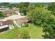 Aerial view of the home and backyard surrounded by mature trees at 4825 Loretta Ln, Orlando, FL 32821