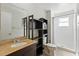Well-lit bathroom with vanity, toilet, shower stall, and cabinet for storage space at 4825 Loretta Ln, Orlando, FL 32821
