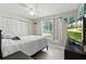 Bright bedroom features ample natural light, ceiling fan, closet, and a soothing atmosphere for relaxation at 4825 Loretta Ln, Orlando, FL 32821