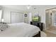 Bedroom featuring closet, ceiling fan, and a neutral color scheme, creating a calming and inviting atmosphere at 4825 Loretta Ln, Orlando, FL 32821