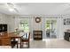 An open-concept dining room features sliding glass doors to the patio, offering natural light and outdoor views at 4825 Loretta Ln, Orlando, FL 32821
